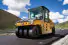Aluguel de Rolo Compactador CAT CW 34 – Máxima Eficiência na Compactação de Asfalto e Solos - Imagem: 1